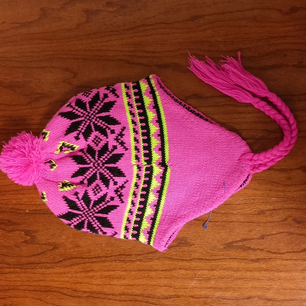 Flap Hat Winter hat covers ears and keeps them warm and cozy.